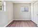 Cozy bedroom with natural light, modern flooring, neutral walls, and closet space at 11112 Dahlia Way, Thornton, CO 80233