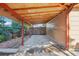 Covered carport with partial privacy fencing and storage at 11112 Dahlia Way, Thornton, CO 80233