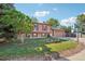 Attractive two-story home with neat landscaping and a spacious front yard leading to a driveway and garage at 11112 Dahlia Way, Thornton, CO 80233