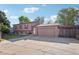 Charming two-story home featuring a spacious driveway, attached two-car garage, and well-maintained lawn at 11112 Dahlia Way, Thornton, CO 80233