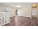 Spacious loft with ample natural light and modern flooring at 11112 Dahlia Way, Thornton, CO 80233