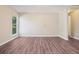 Versatile room with neutral walls, modern flooring, and a large window at 11112 Dahlia Way, Thornton, CO 80233