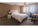 Inviting bedroom with a ceiling fan and ample sunlight at 1359 S Chambers Cir # C, Aurora, CO 80012