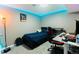 Cozy room featuring blue LED lights, a keyboard and computer desk at 1359 S Chambers Cir # C, Aurora, CO 80012