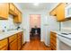Efficient kitchen opens to the dining room at 1359 S Chambers Cir # C, Aurora, CO 80012
