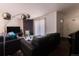 Comfortable living room flows nicely to dining area at 1359 S Chambers Cir # C, Aurora, CO 80012