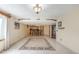 Spacious basement features tile floors, recessed lighting, and a quaint wet bar at 46303 E 106Th Ave, Bennett, CO 80102