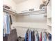 Walk-in closet with ample storage space, shelving, and hanging racks at 46303 E 106Th Ave, Bennett, CO 80102