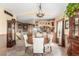 Inviting dining room area with hardwood floors and staircase at 46303 E 106Th Ave, Bennett, CO 80102