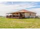 Charming single-story home with a covered deck and a spacious yard at 46303 E 106Th Ave, Bennett, CO 80102
