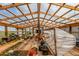Bright greenhouse with transparent roof, raised garden beds, and plenty of room for all your growing needs at 46303 E 106Th Ave, Bennett, CO 80102