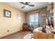 Bright home office with a large window offering natural light and scenic views at 46303 E 106Th Ave, Bennett, CO 80102