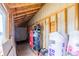 Spacious storage area with exposed beams and insulation, ideal for farm supplies at 46303 E 106Th Ave, Bennett, CO 80102