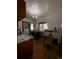 Functional kitchen space with hardwood floors and ample room for dining at 1731 E 25Th Ave, Denver, CO 80205