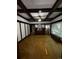 Spacious living room featuring beautiful wood paneling and unique ceiling design at 1731 E 25Th Ave, Denver, CO 80205