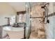 Luxurious bathroom showcasing a soaking tub and walk-in shower with upscale tile at 11321 Mesa Verde Pl, Parker, CO 80138