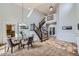 Spacious foyer with high ceilings, decorative lighting, and an elegant staircase at 11321 Mesa Verde Pl, Parker, CO 80138