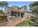 Charming home featuring neutral siding, a cozy front porch with decorative columns, and manicured landscaping at 11321 Mesa Verde Pl, Parker, CO 80138