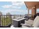 Back deck with a fire table and furniture with a view at 13084 Deer Ridge Way, Larkspur, CO 80118