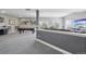 Basement area with a pool table, comfortable seating, and partial wall at 13084 Deer Ridge Way, Larkspur, CO 80118