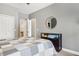 Bedroom with closet access, side table and view from window at 13084 Deer Ridge Way, Larkspur, CO 80118