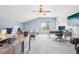 Spacious bonus room offering desk and seating areas, ceiling fan, and natural light at 13084 Deer Ridge Way, Larkspur, CO 80118