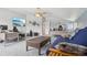 Large bonus room with multiple desks, ceiling fan, and tv at 13084 Deer Ridge Way, Larkspur, CO 80118