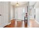 Bright entryway showcasing beautiful hardwood floors and a charming decor at 13084 Deer Ridge Way, Larkspur, CO 80118