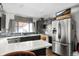 Kitchen with stainless steel appliances and white countertops at 2220 S Linley Ct, Denver, CO 80219