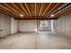 Open basement with unfinished ceiling and concrete floor, offers lots of potential at 2550 S Cutters Cir # 105, Castle Rock, CO 80108