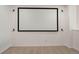Bright, carpeted bonus room with a movie screen and neutral decor at 2550 S Cutters Cir # 105, Castle Rock, CO 80108