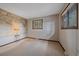 Unfurnished bedroom with a scenic wallpaper and two windows providing natural light at 28630 Pine Dr, Evergreen, CO 80439