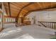 Spacious living area featuring an open floor plan with hardwood accents and natural lighting at 28630 Pine Dr, Evergreen, CO 80439