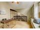 Bright home office features large windows, built-ins and an attached staircase at 7409 E Jamison Dr, Centennial, CO 80112