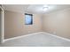 Spacious basement with neutral carpeting at 4770 S Jason St, Englewood, CO 80110