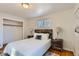 Well-lit bedroom with closet and wood floors at 4770 S Jason St, Englewood, CO 80110