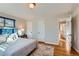 Bright bedroom with hardwood floors and a view at 4770 S Jason St, Englewood, CO 80110