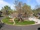 Stunning aerial view of a ranch style home showcasing mature landscaping and a circular driveway at 4951 Sanford W Cir, Cherry Hills Village, CO 80113