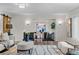 Cozy dining room area with a modern chandelier, stylish art, and a window with natural light at 4951 Sanford W Cir, Cherry Hills Village, CO 80113