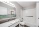 Bathroom with bathtub, sink, and toilet at 9026 E Mansfield Ave, Denver, CO 80237