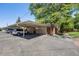 Covered carport parking with ample space for multiple vehicles at 9026 E Mansfield Ave, Denver, CO 80237