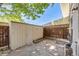 Patio with storage shed and wooden fence at 9026 E Mansfield Ave, Denver, CO 80237