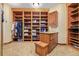 Custom closet design featuring built-in shelving and drawers for optimal organization at 14154 Lexington Cir, Westminster, CO 80023