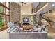 Spacious living room with tall ceilings, fireplace, and comfortable seating arrangement at 14154 Lexington Cir, Westminster, CO 80023