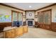 A cozy office area with a fireplace, natural light and warm wood trim detail at 14154 Lexington Cir, Westminster, CO 80023