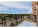 Balcony with a blue patterned rug and views of the surrounding neighborhood and blue skies at 9019 E Panorama Cir # D418, Englewood, CO 80112