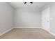 Spacious bedroom featuring neutral carpet and abundant natural light at 9019 E Panorama Cir # D418, Englewood, CO 80112