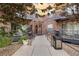 Inviting building entrance with well-kept landscaping and accessibility features at 9019 E Panorama Cir # D418, Englewood, CO 80112