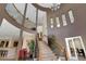 Spacious entrance foyer with stairs and unique architectural details at 9019 E Panorama Cir # D418, Englewood, CO 80112