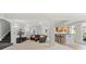 Finished basement with carpet, a sectional couch, and kitchen area at 828 Rabbit Run Dr, Golden, CO 80401